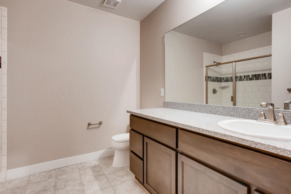 View one of Finished Basements & More by Sheffield Homes' basement bathrooms: PF18011. Contact us to schedule a free consultation for your basement finishing project.